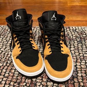 Gently worn suede camel and black Jordan 1 mid tops